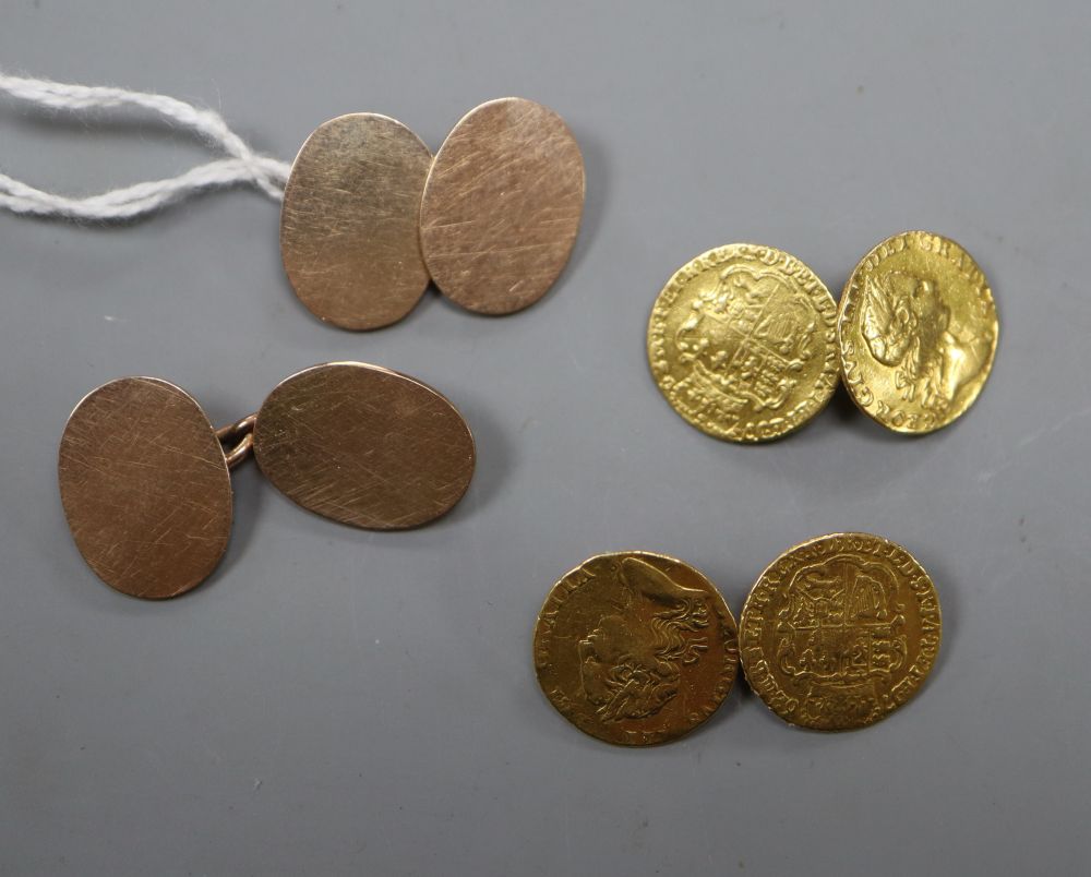 A pair of mounted George III one third guinea cufflinks, gross 10 grams and a pair of yellow metal cufflinks, 10.5 grams.